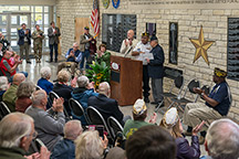 American Legion presenting donation check during dedication. Image courtesy of Tom Parish.