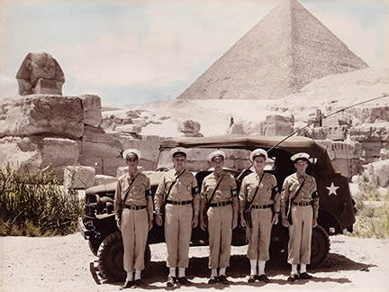 Cpl. Friedrich (2nd from left) and other MP's in his unit photographed while waiting for President Roosevelt to return from a tour of the Pyramids near Cairo, Egypt.