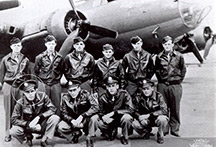 Ernest Newell (circled) with the crew pose in their B-17.